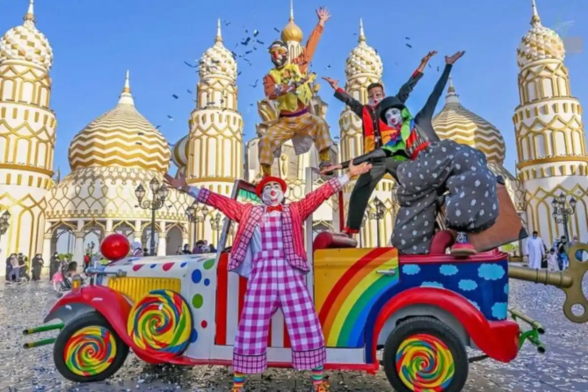 Performers on a painted parade car — Global Village Dubai